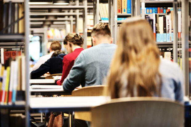 students in library