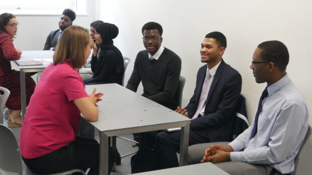 Students at an industry networking event.