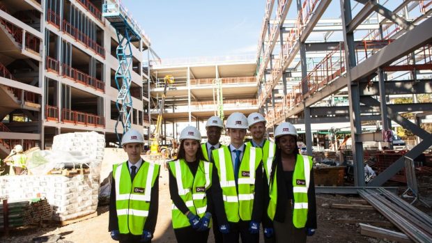 Students and headmaster at the school's site